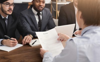 female-candidate-holding-resume-desk-job-interview-reading-personal-information-copy-space
